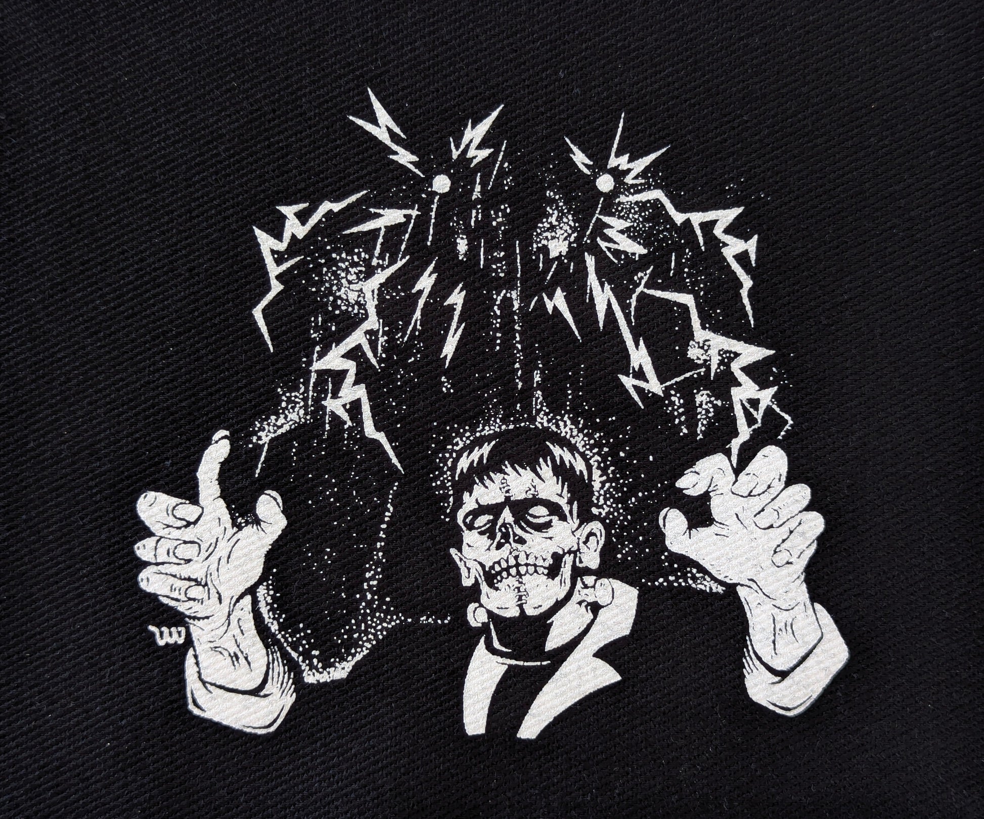Black and white illustration of a skeleton  Frankenstein on a textured black background
