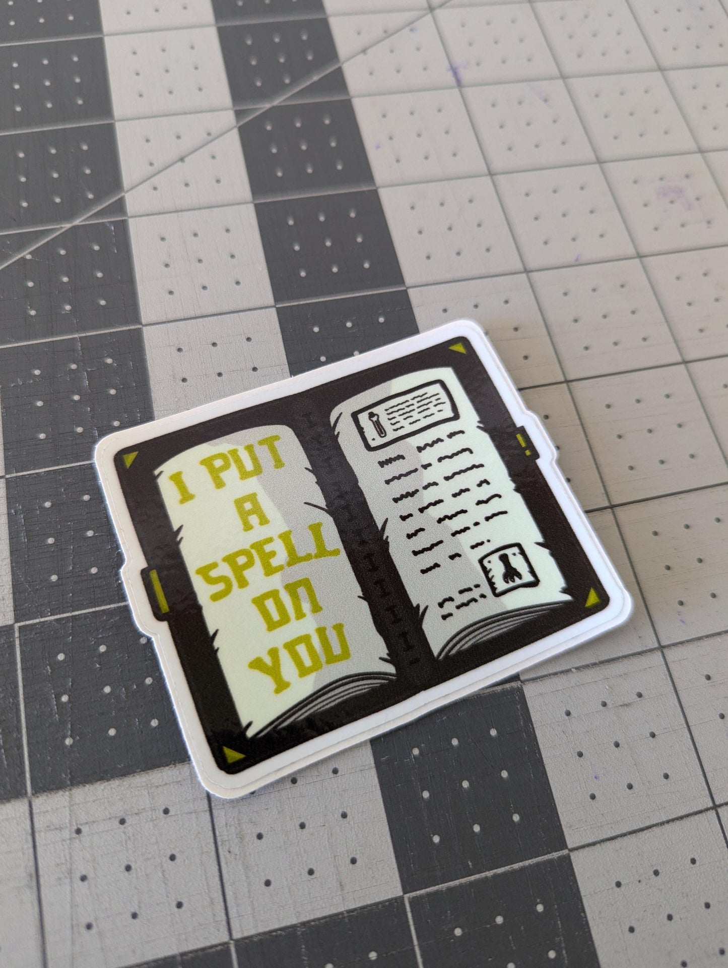 "Grimoire Spell Book" Sticker